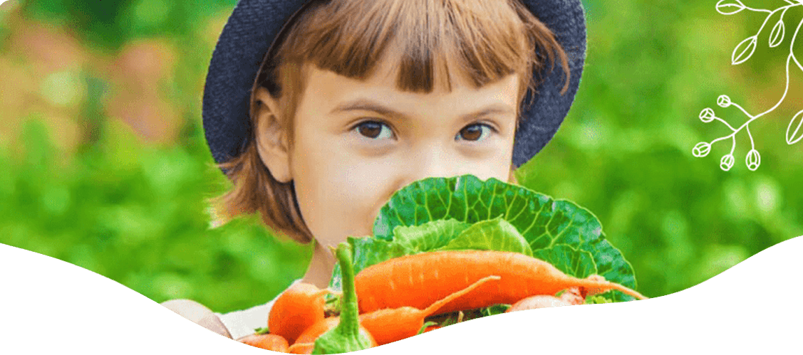 Girl holding vegetables — Blog in Ashmore, QLD