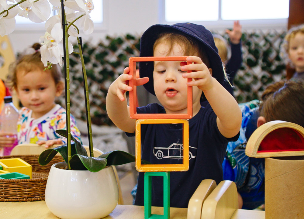Kid Playing with Shapes