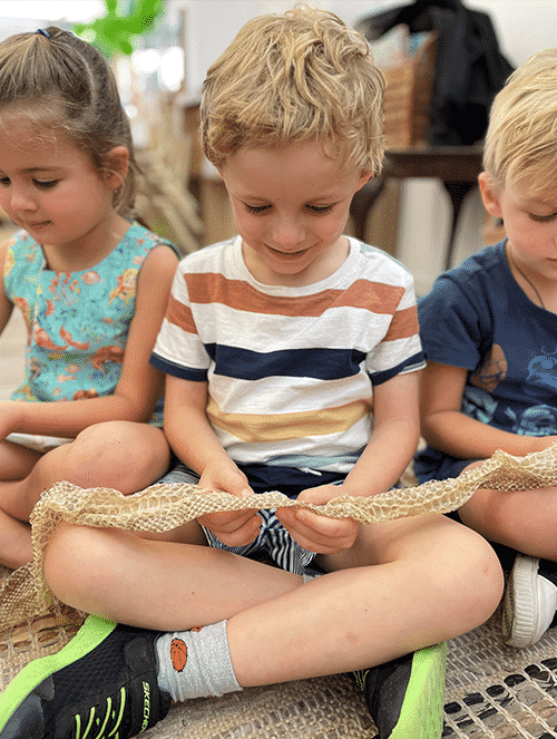 Children Holding Snake's Skin — Early Learning Centre in Mermaid Waters, QLD
