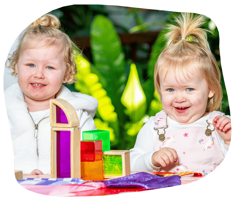 Two Little Girls Smiling — Early Learning Centre Maudsland,QLD