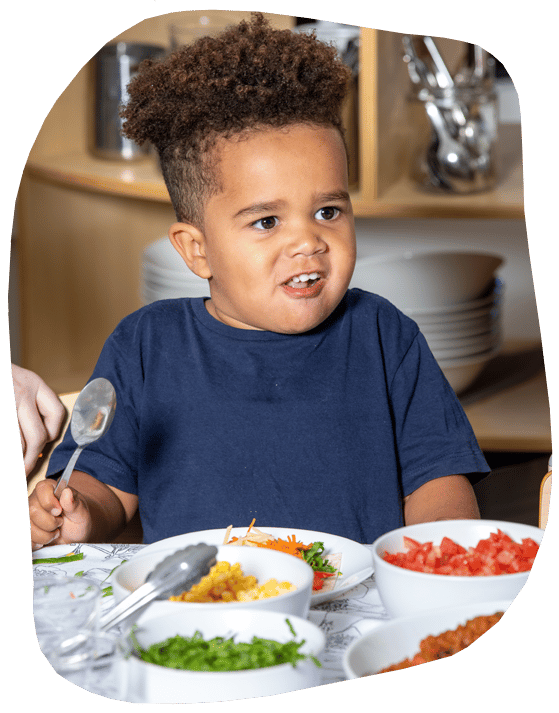 A Kid Eating — Early Learning Centre Maudsland,QLD