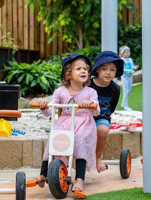 Happy Two Kids Playing Together — Early Learning Centre in Ashmore, QLD