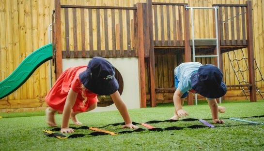 Two Children Playing on A Playground — Early Learning Centre Maudsland,QLD