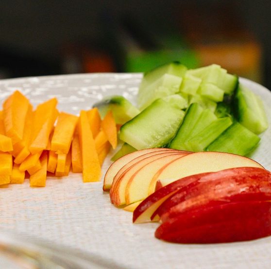 White Plate with Sliced Apples, Celery, and Carrots — Early Learning Centre Maudsland,QLD