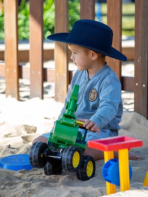 Boy with cowboy hat and toys — Early Learning Centre in Maudsland, QLD
